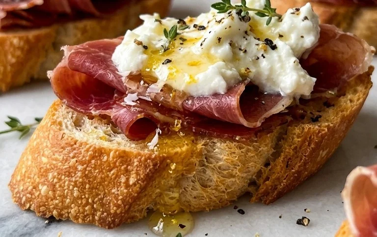 Beef Prosciutto Crostini with Burrata and Lemon Honey Drizzle